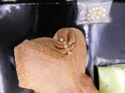 striking gold gene tops